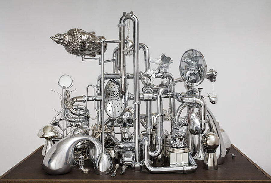 David Baskin, “Vanitas,” chrome, metal, plastic and wood, 48”x72”x32”, 2017.