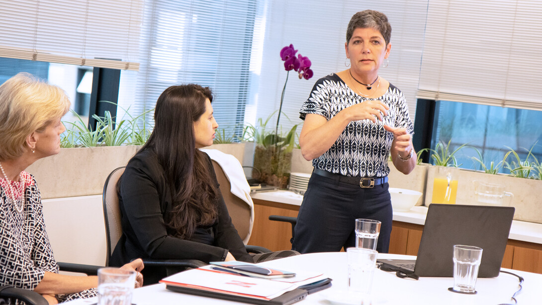 Denise Ruschel Bandeira, professor, Universidade Federal do Rio Grande do Sul, right, shares findings from the Dimensional Inventory for Child Development Assessment (IDADI) pilot impact project. (Photo by Kyleigh Skaggs, CYFS)