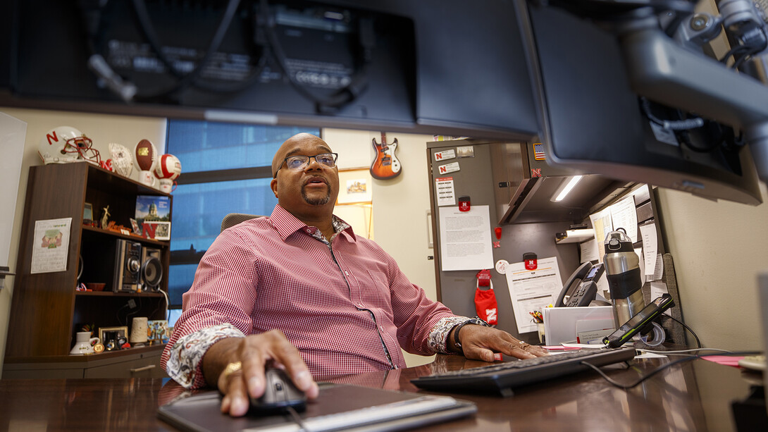 Nebraska's Mark Davis meets with a student via Zoom in his College of Business office. Davis has worked for 25 years at the university, first as a student recruiter and more recently as a full-time student adviser.