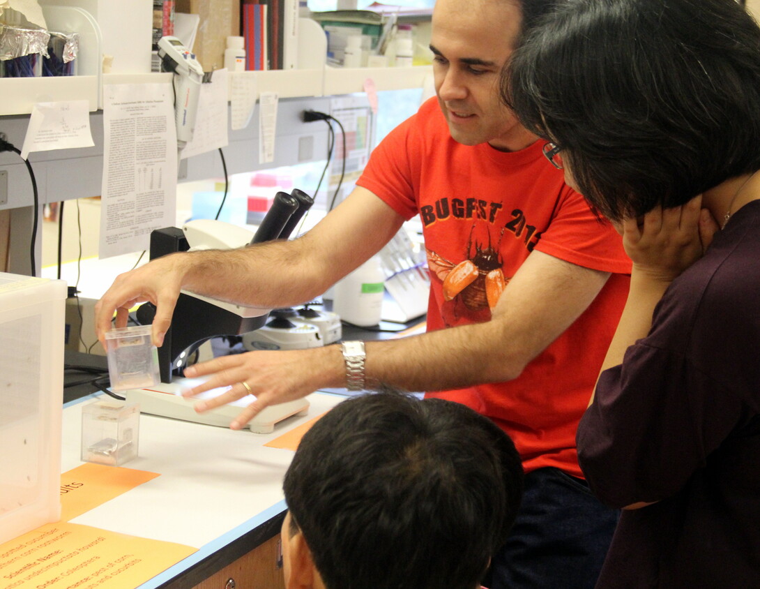 Entomology graduate student Adriano Pereira educates visitors during Bugfest 2013.