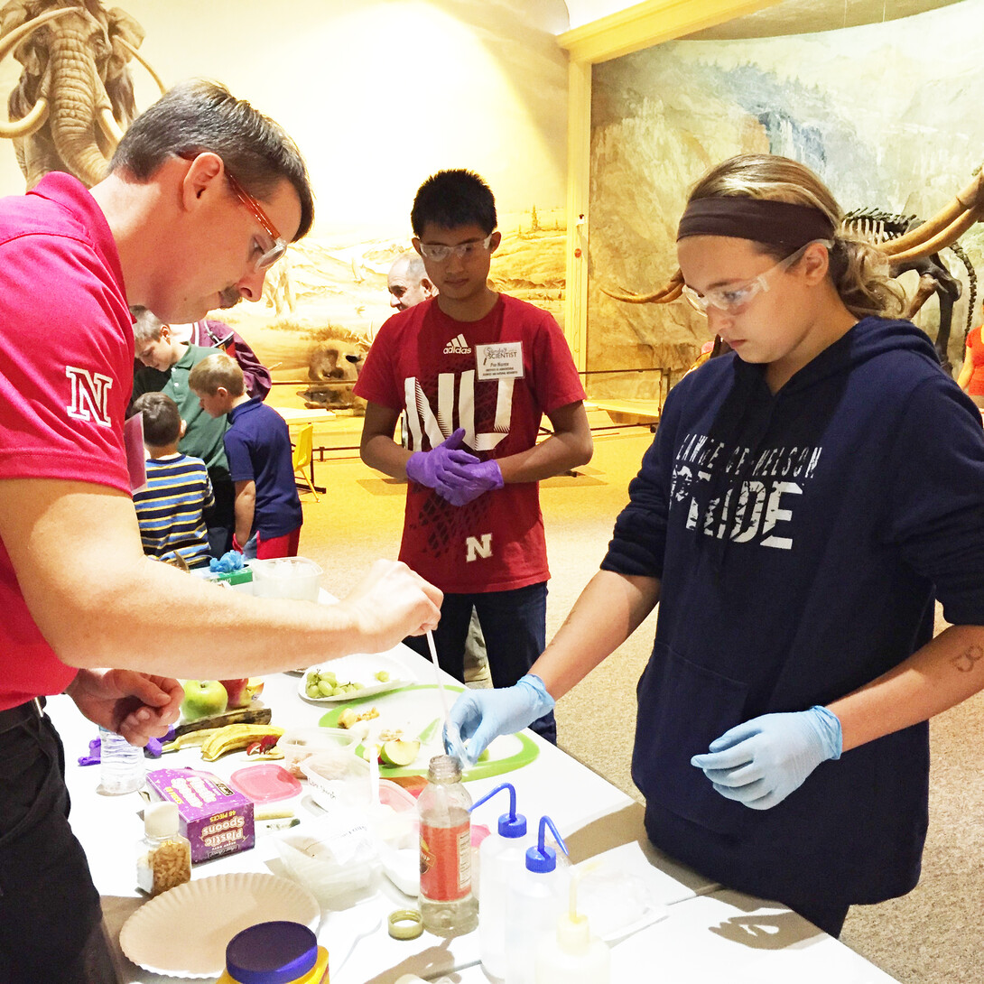 Students and families participate in a Sunday with a Scientist event at the University of Nebraska State Museum. UNL's Science Literacy Initiative served as a guest presenter to help educate young people on topics relating to science, technology, engineering and math.