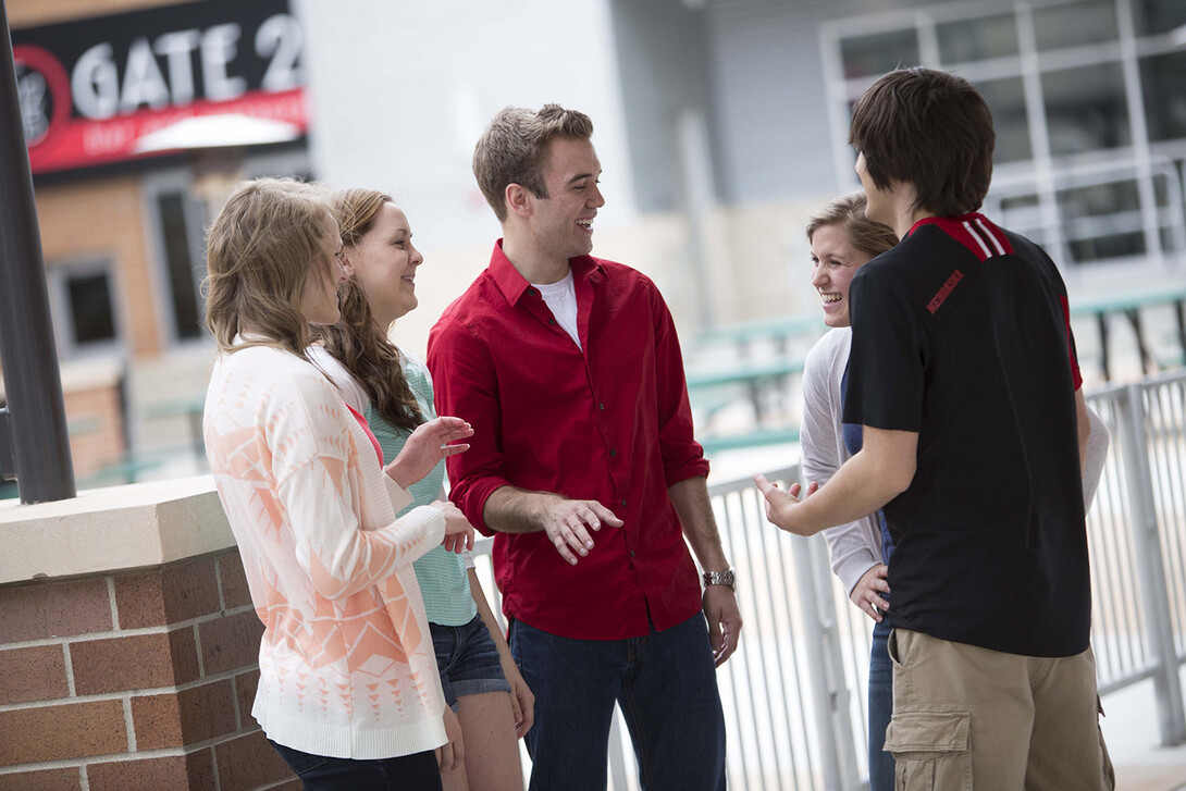 CBA Honors Academy students converse in Lincoln's Railyard entertainment district. Forty-three recent high school graduates have been selected to join the academy in the fall.