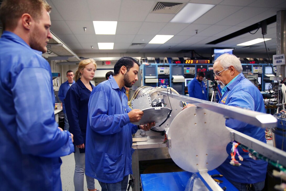 University of Nebraska-Lincoln student Firdavskhon Nasimov prepares to place the university’s student experiment into the RockSat-X payload at the Wallops Flight Facility in Virginia.