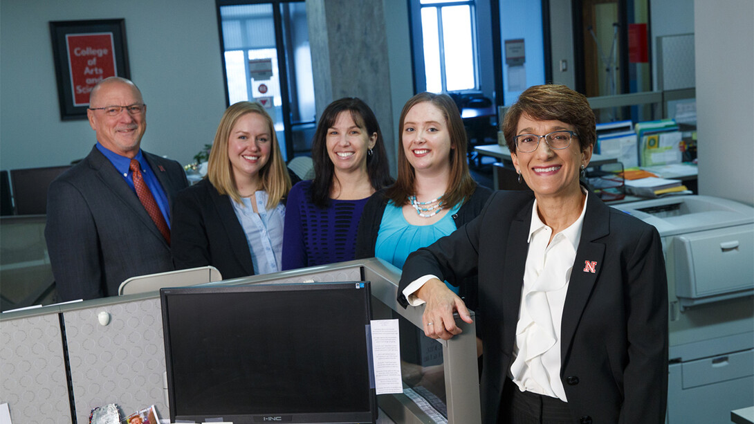 Michelle Graef, research associate professor in the University of Nebraska-Lincoln's Center on Families, Children and the Law, is leading a major research effort to strengthen the nation's child welfare agency workforce and improve children's lives. She is shown with her team (from left), Mark Ells, Kate Stephenson, Megan Paul and Stephanie Weddington.