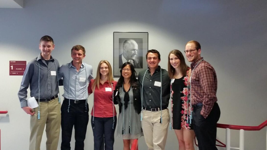 Biochemistry students (from left) Andrew Schacht, Sam Taylor, Brianna Kellar, Tiffany Truong, Colton Roessner, Allison Vlach and Drew Egger were inducted into the American Society for Biochemistry and Molecular Biology Chi Omega Lambda Honor Society.