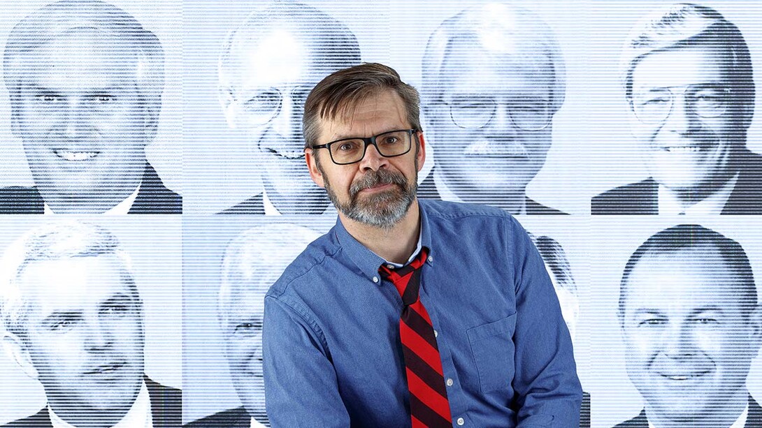 Kevin Smith, professor of political science, has published findings that people can choose liberals or conservatives by a viewing a person's photo or video. Behind Smith are photos from the 2003 Congressional Pictorial Directory. Top row from left: John Duncan (R-TN), John Olver (D-MA), George Miller (D-CA), Phil Crane (R-IL). Bottom row from left: John Shadegg (R-AZ), Jim McDermott (D-WA) and Dana Rohrabacher (R-CA).