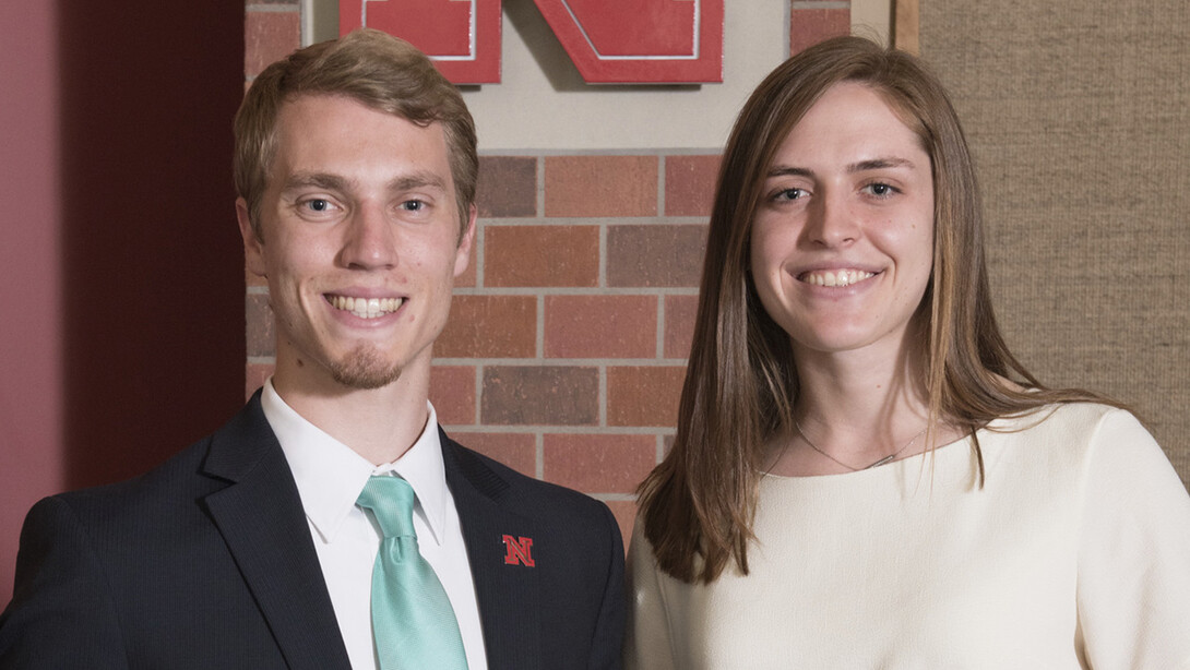 Outstanding Student Leadership Award winners Jackson Grasz and Lauren Maciejewski stand with their awards during a ceremony April 13.