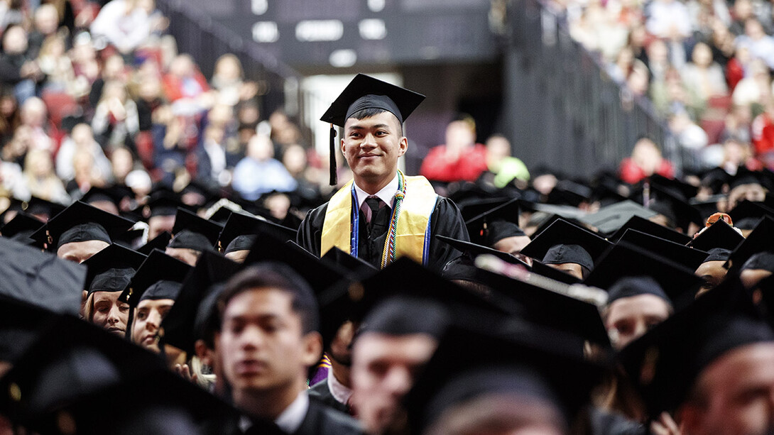 Phat T. Nguyen is recognized during the undergraduate commencement ceremony Dec. 15 at Pinnacle Bank Arena. Nguyen was commissioned a second lieutenant in the U.S. Army on Dec. 15.