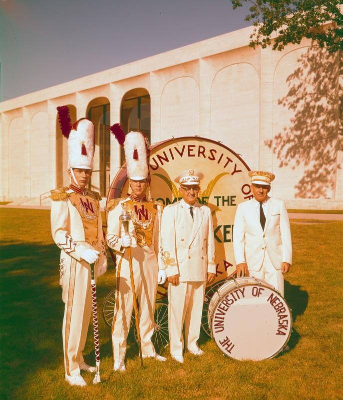 Drum majors, with band directors Jack Snider and Don Lentz, stand in front of the large drum “Big Bertha” near the Sheldon Art Museum on Sept. 16, 1966.