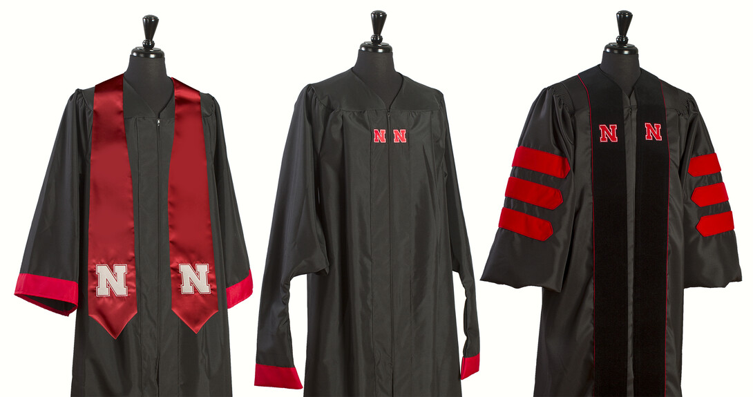 Starting with spring commencement, gowns worn by graduates will feature the Nebraska "N." Gowns shown here are for (from left) undergraduate students, graduate students and doctoral students.