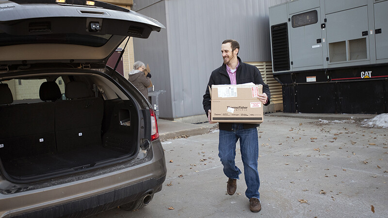 Andy Little and Dee Ebbeka load up donations to take to Clinton Elementary School