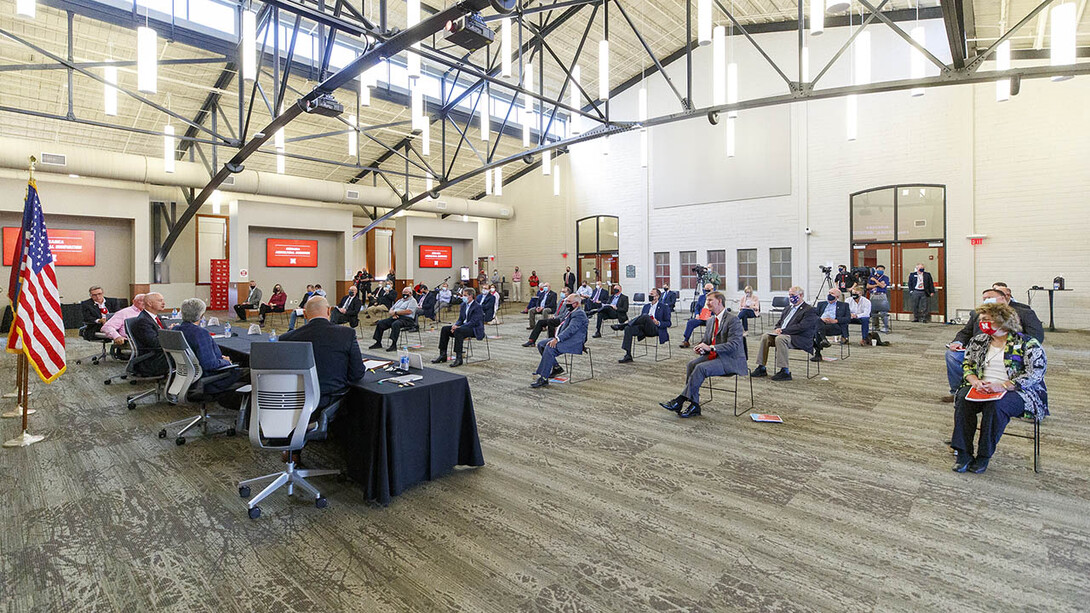 The panel discussion featured socially distanced seating amid the COVID-19 pandemic.