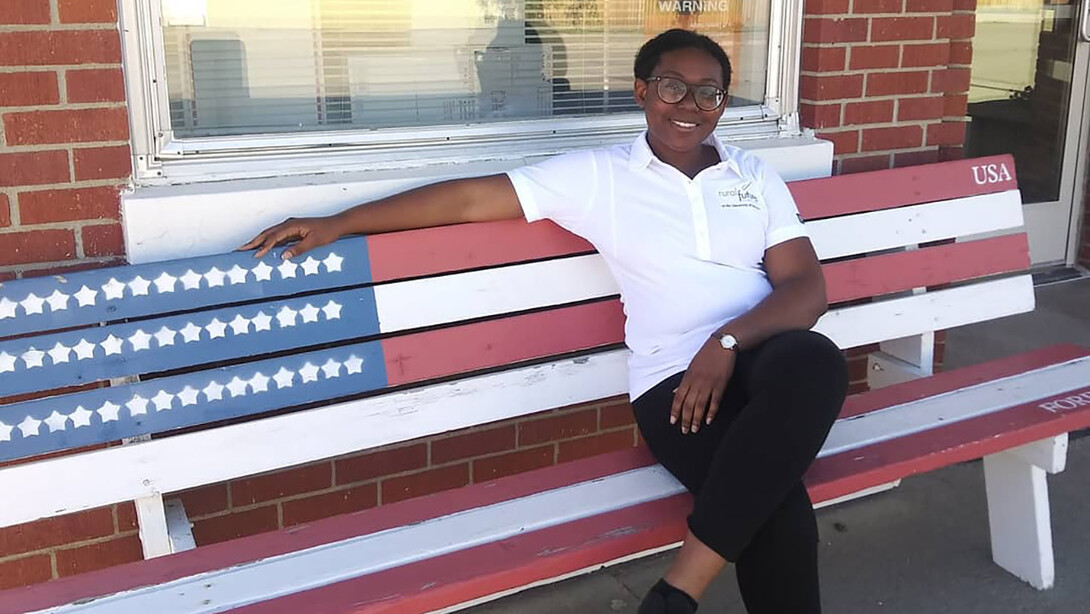 Judith Grey poses for a photo in Osmond, Nebraska, during her summer fellowship. Grey and her teammate, Marie Meis, traveled to the community to capture drone footage and video interviews to be used in a community marketing video.