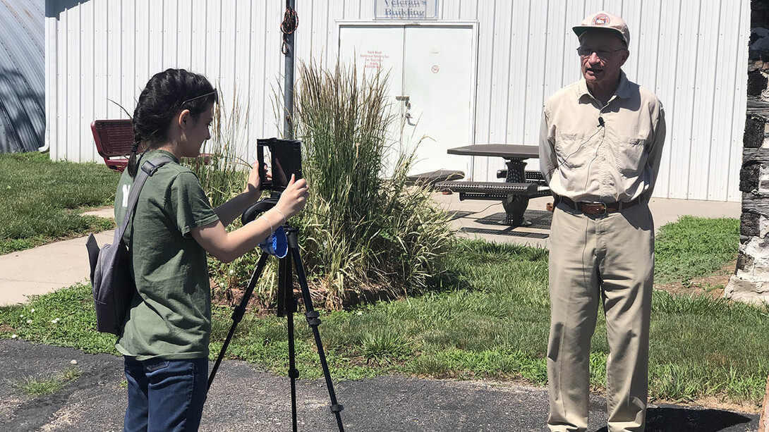 Rachel Williss, a junior agricultural and environmental sciences communication major at Nebraska, photographs Robert Diffendal, professor emeritus in the School of Natural Resources, during her fellowship this summer in Pawnee County. The Rural Fellows program is expanding in 2021, with up to 200 students and 100 communities to be accepted.
