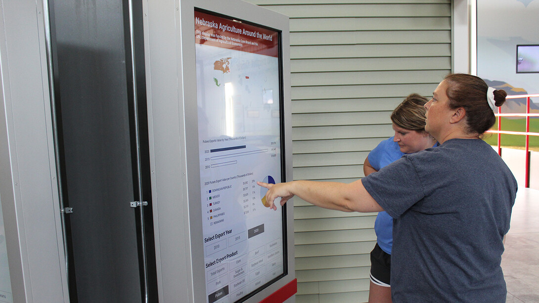  A digital display board at Raising Nebraska shows how agricultural exports from Nebraska make their way around the world.