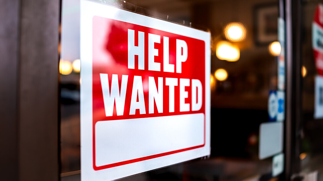 Help wanted sign in window