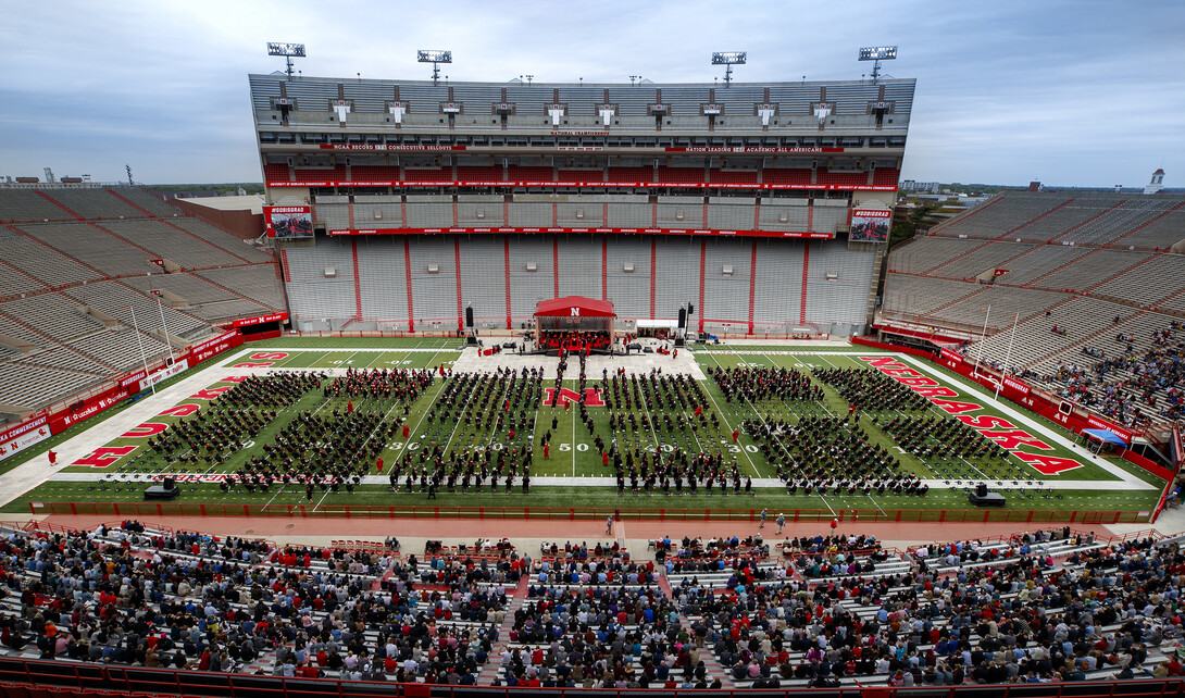 Graduates receive their degrees during May 2021 undergraduate commencement at Memorial Stadium