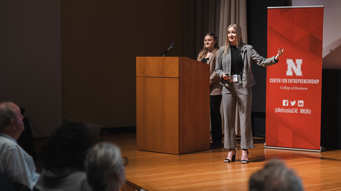 Grace Clausen and Bridget Peterkin, both senior computer science majors from Omaha, present their team's business, Dyslexico, during the 2023 New Venture Competition. Dyslexico is a spell-check and autocorrect solution optimized for people with dyslexia.