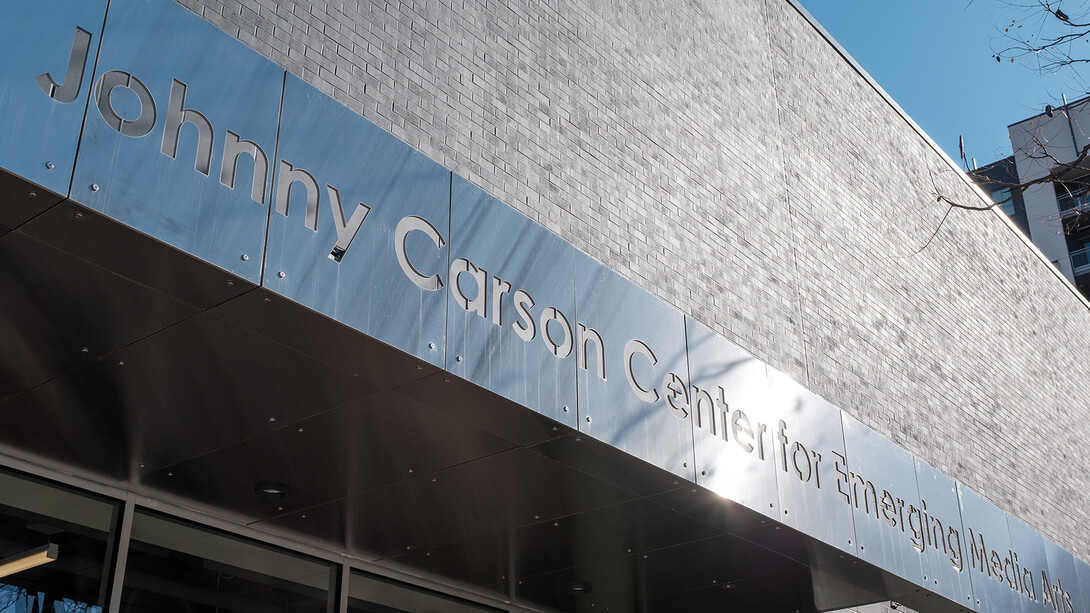 A metal sign reads "Johnny Carson Center for Emerging Media Arts."