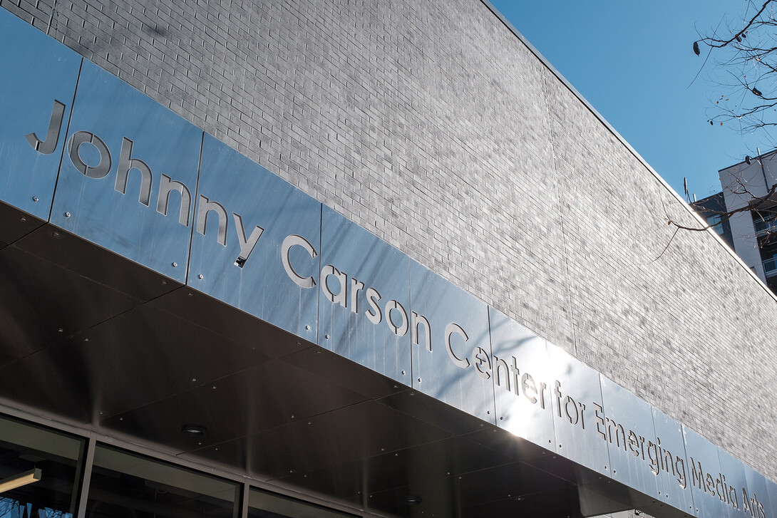 A metal sign reads "Johnny Carson Center for Emerging Media Arts."