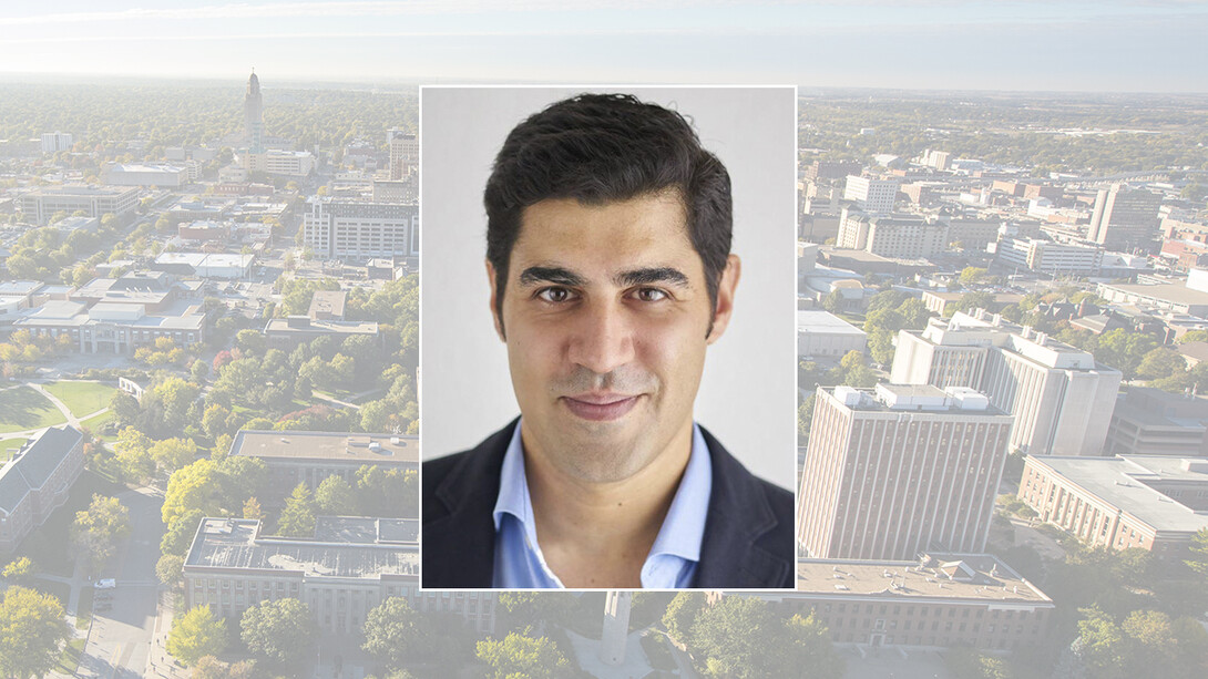 Color photo of Parag Khanna on color campus background