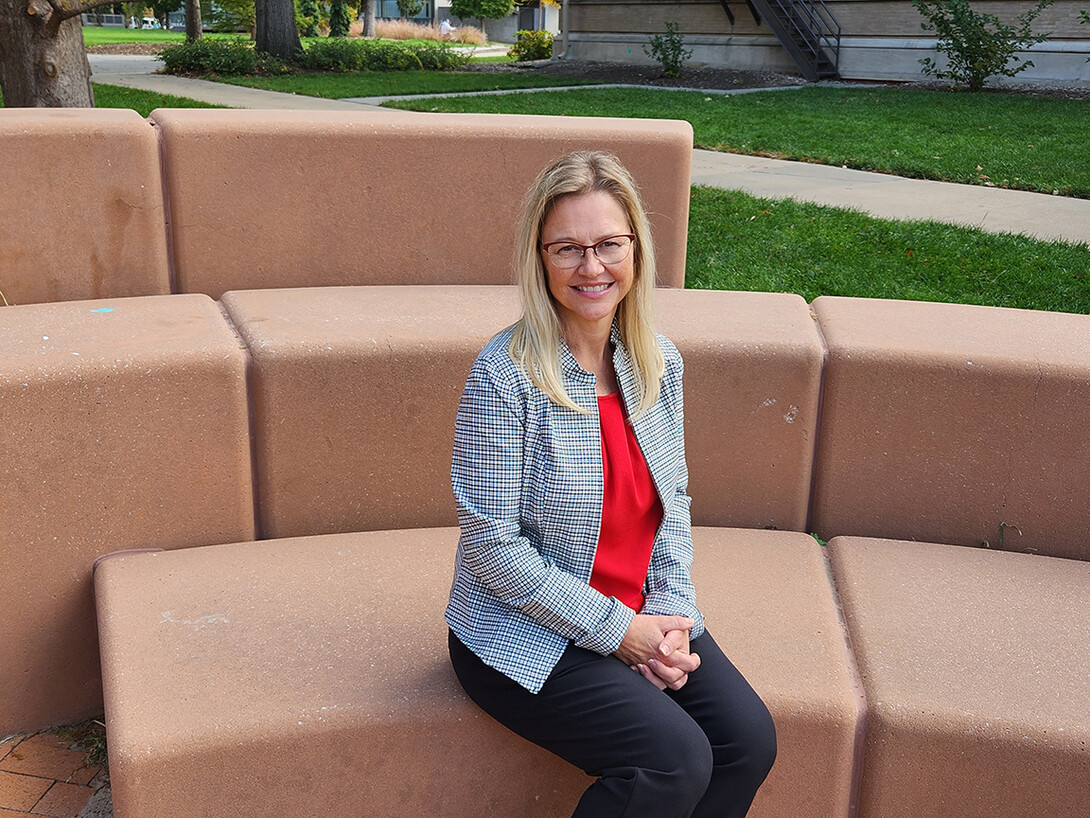 Kyla Gorji sits on campus.