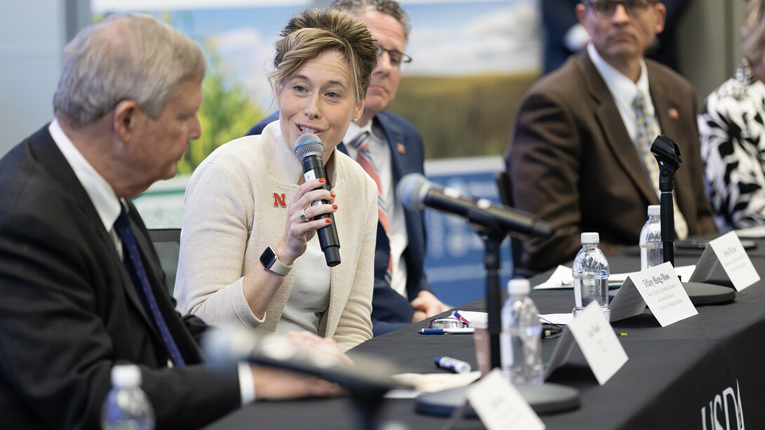 Tiffany Heng-Moss, dean of the College of Agricultural Sciences and Natural Resources, talks to U.S. Agriculture Secretary Tom Vilsack during his visit on March 28.