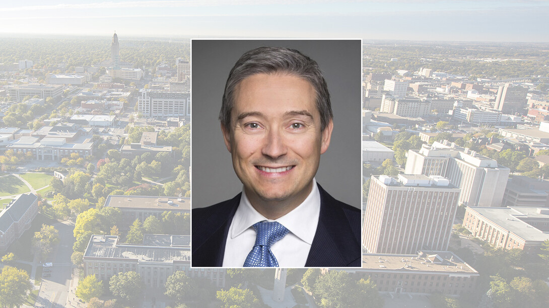 Color portrait of François-Philippe Champagne on color campus background