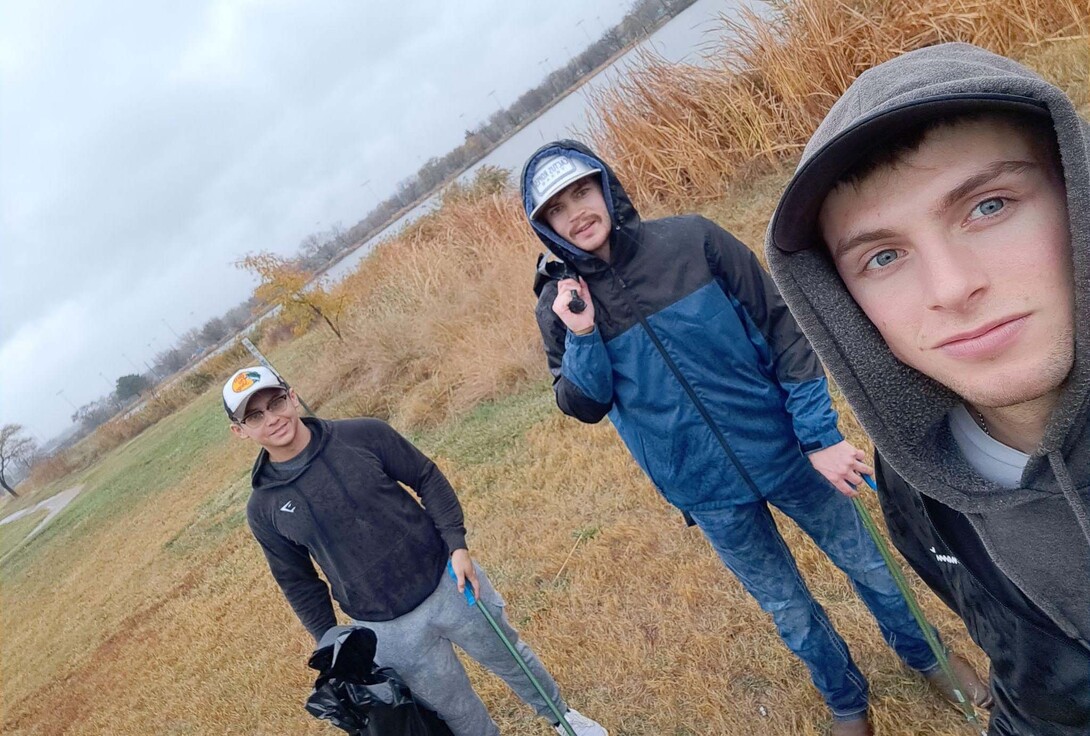 (From left) Jovani Lopez, Klayton Hilbers and Brant Benes pose near Lincoln's Oak Lake.