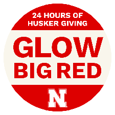 A red-and-white logo that reads "Glow Big Red — 24 Hours of Husker Giving."