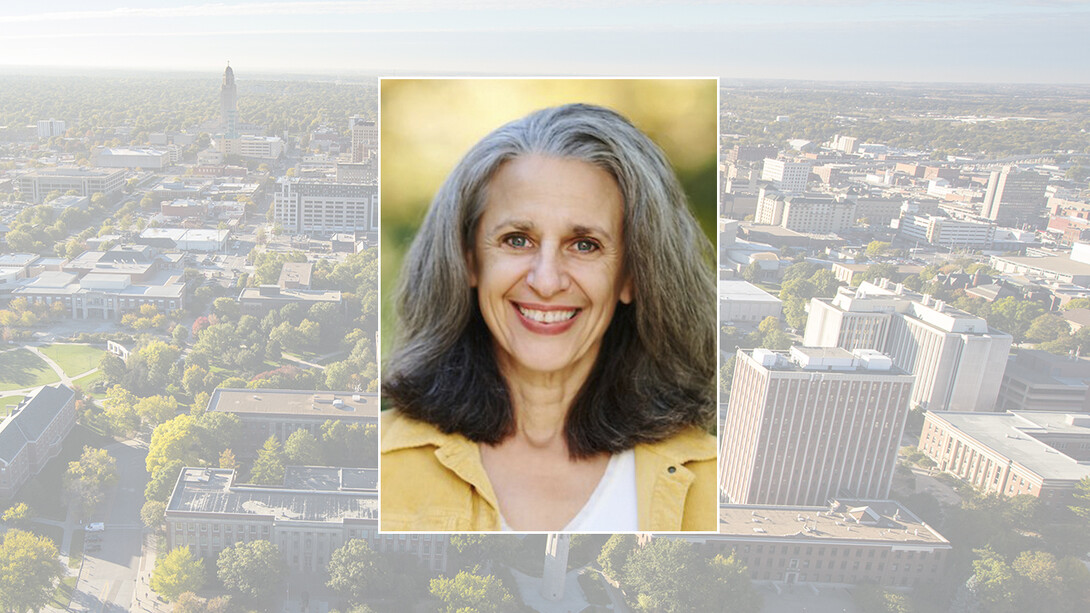 Color portrait of Tamar Haspel, food columnist for The Washington Post, on a color campus background.