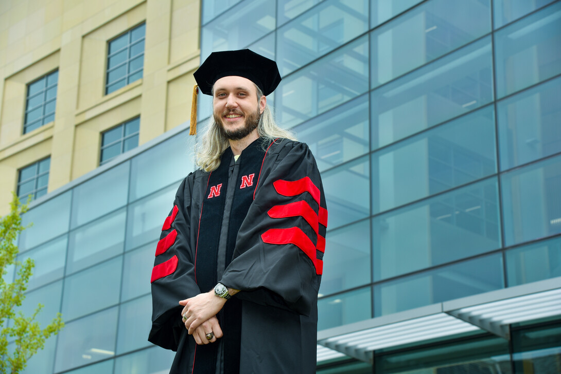 Hanna joins other graduate students for commencement at Pinnacle Bank Arena on May 7.