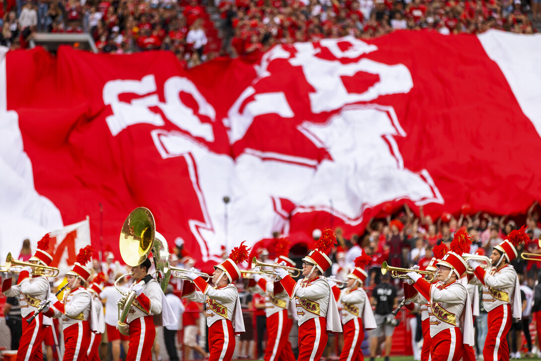 The Cornhusker Marching Band marches past fans in Memorial Stadium Sept. 4, 2021. The 2022 home opener is Sept. 3.
