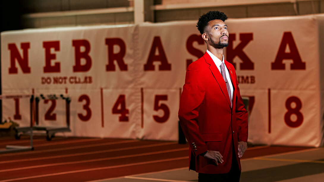 Sadio Fenner standing on the indoor track at the Devaney Sports Center.