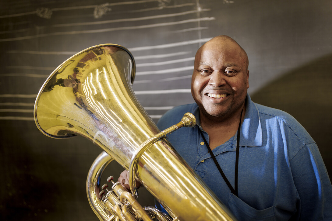 Kabin Thomas is photographed with his tuba.