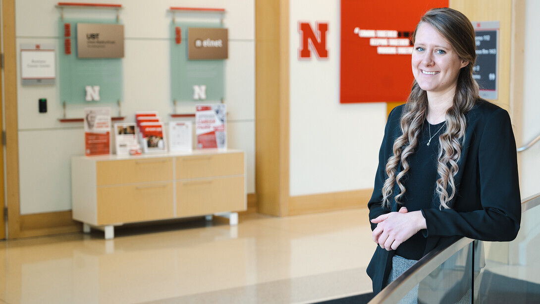 Jaylen Peters standing in the College of Business