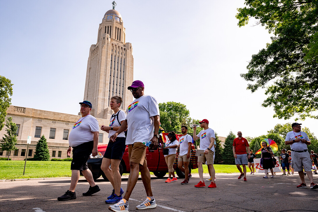 University of Nebraska representatives walk around the State Capitol during the Star City Pride parade on June 18.