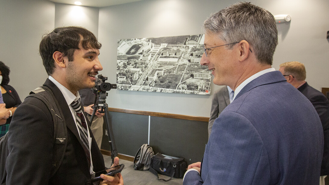 Ethan Halman Gonzalez, a senior environmental studies major from Texas, talks one-on-one with James Kvaal on Sept. 16. Kvaal also talked with students at the University of Nebraska at Omaha.