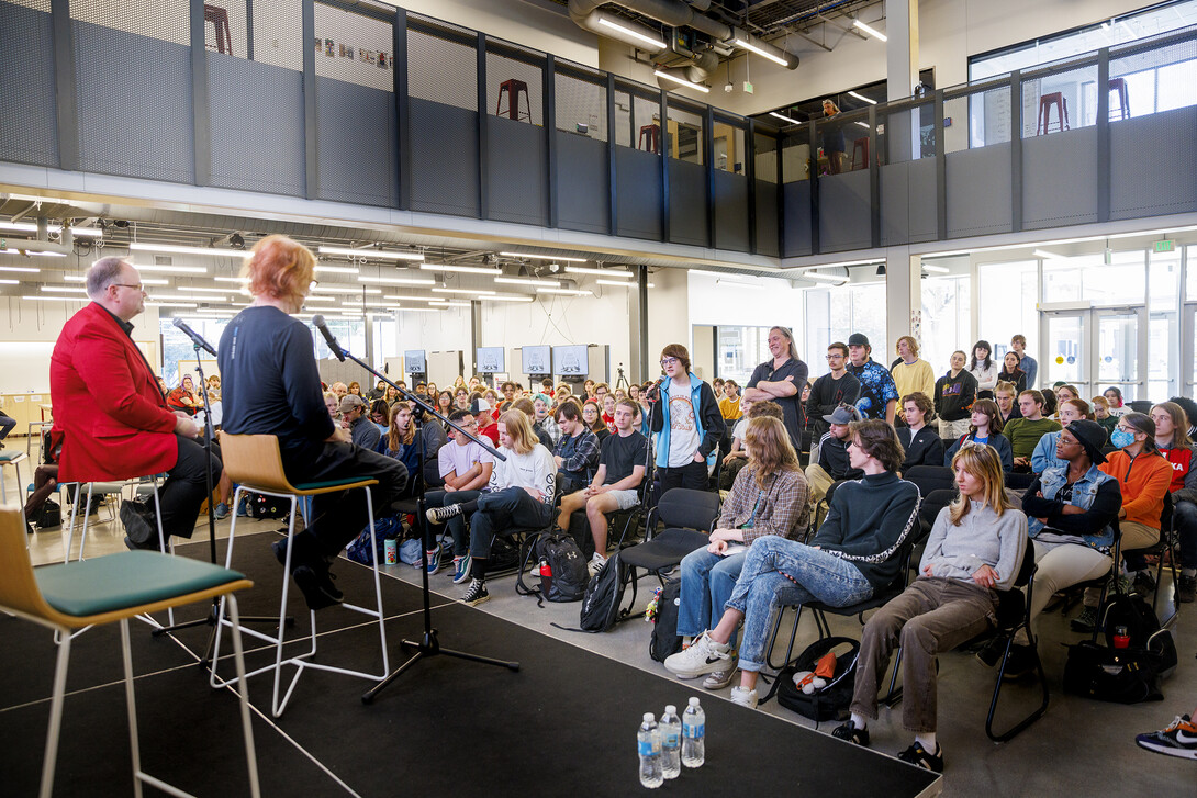 Danny Elfman (seated, wearing black) talks with the campus community Oct. 7.