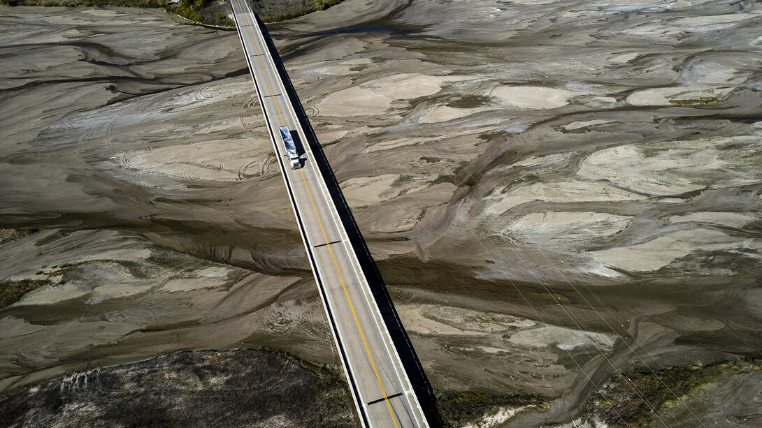 A grain truck crosses the dry Platte River near Chapman, Nebraska, on Oct. 13. At the time, the U.S. Drought Monitor reported that the area around Chapman was in severe/extreme drought.