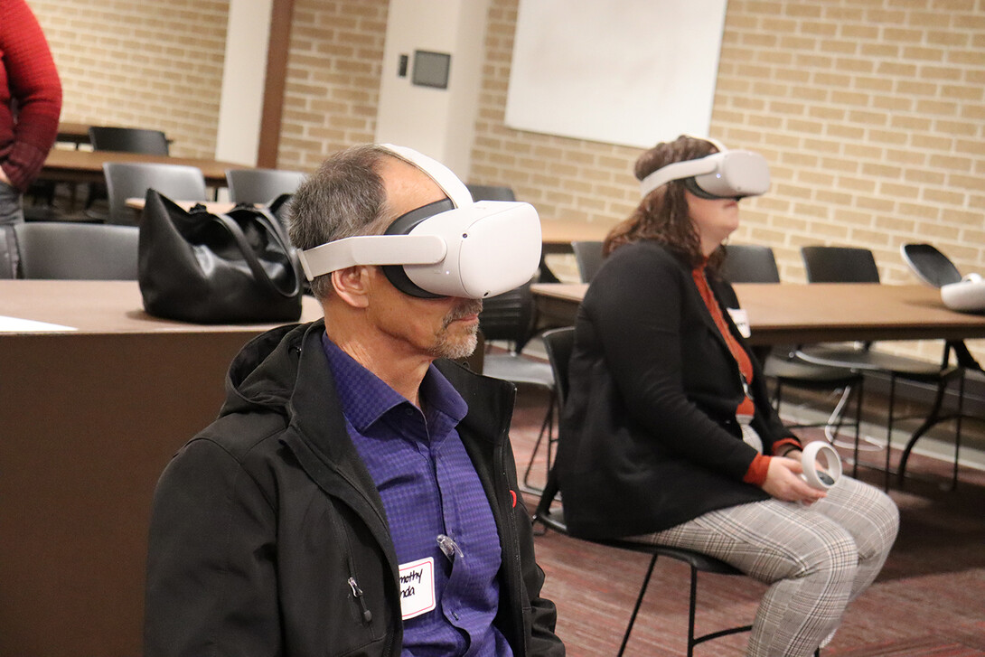 Many attendees, including Timothy Janda and Leah Widdowson, tried virtual reality and learned how it could be used in the classroom at the Fall 2022 Teaching and Learning Symposium. November 11, 2022. Photo by Molly Mayhew / CTT