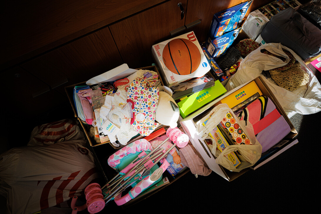 Gifts from donors wait to be sorted for Holidays for Little Huskers.