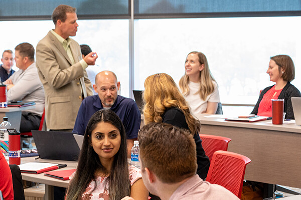 Jason Alsup (seated, middle) took the in-person Adaptive Leadership course taught in summer 2023.