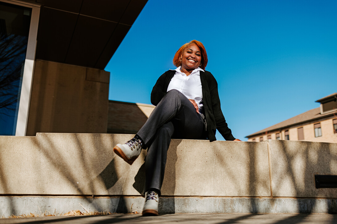 Alaya Greene smiles for a photo on East Campus