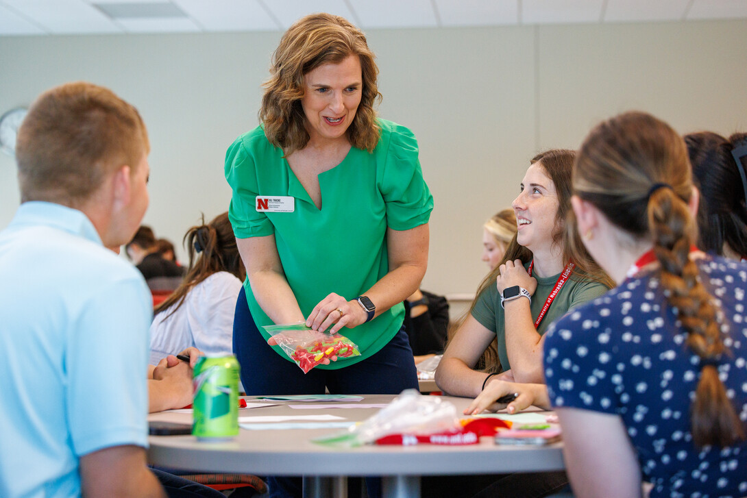 Jill Trucke, the accounting professor, leads her group through an accounting exercise for a fictional fruit stand. June 2, 2023. Photo by Craig Chandler / University Communication.