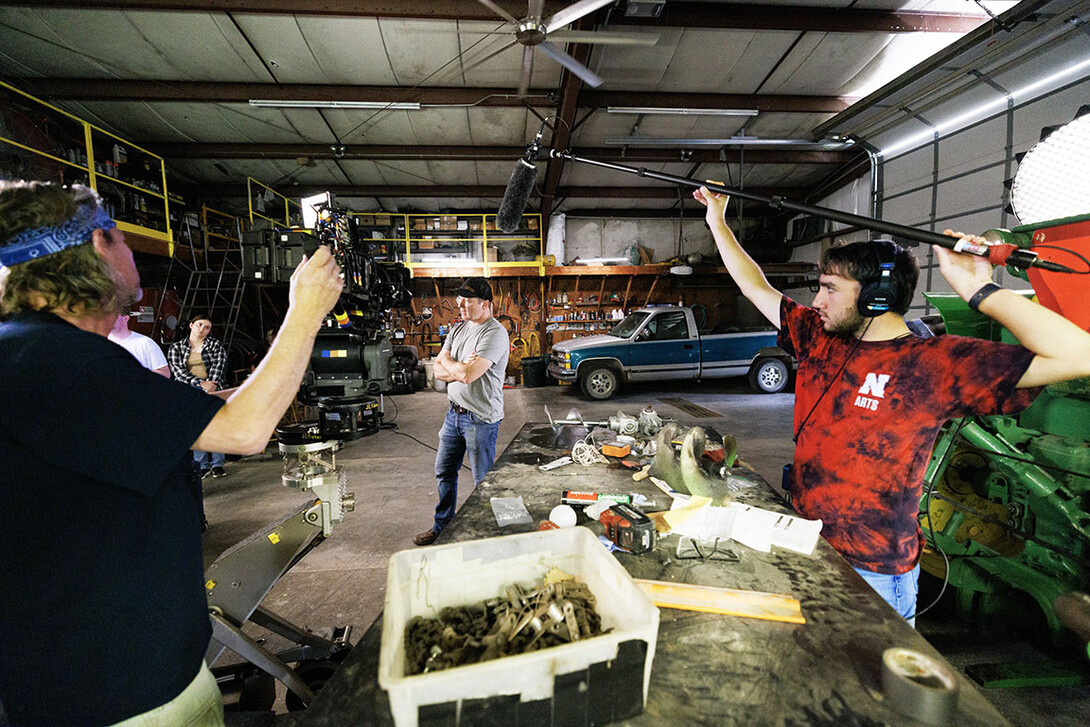 Lincoln actor Eric Moyer acts his lines as he is filmed by director of photography Barry Joyce and UNL student Isaiah Griffith holds a boom mic.