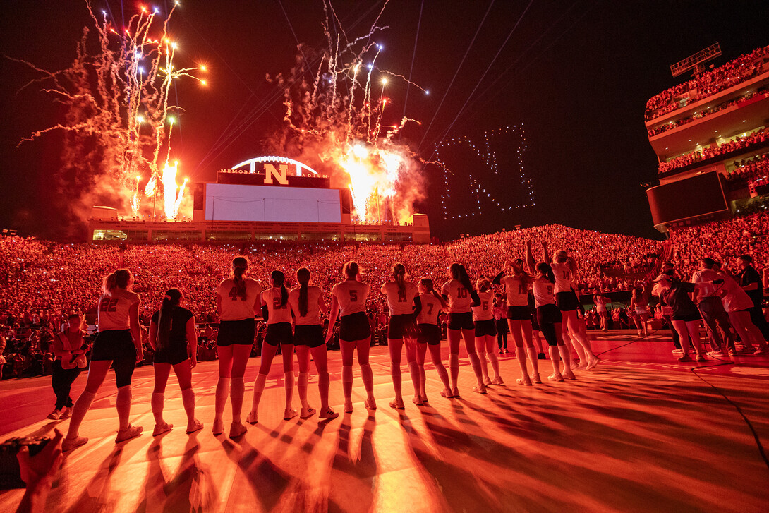 Nebraska volleyball players and fans take in the drone show at Memorial Stadium on Volleyball Day, Aug. 30, 2023.