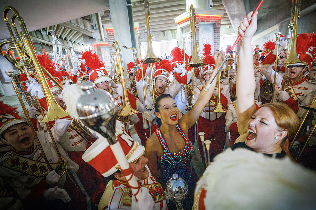 The Cornhusker Marching Band fires up before taking the field after marching to the stadium.