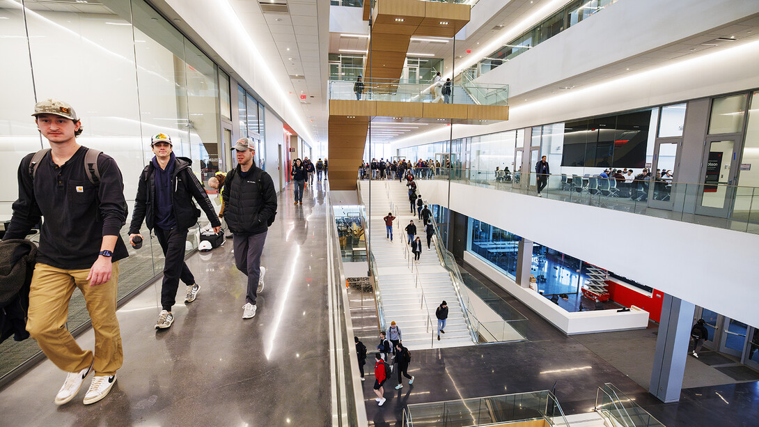 Students walk on the second floor of Kiewit Hall.