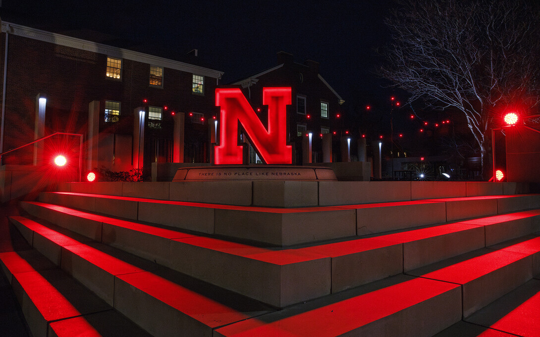 The "N" sculpture at the Nebraska Alumni Association glows red during the NU Foundation fundraiser.